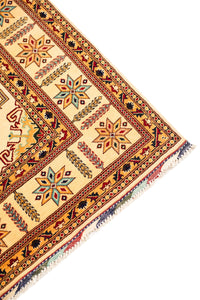 Turkmani Hand-Knotted Wool Area Rug in Red, 9'10 x 6'8 (view 3)